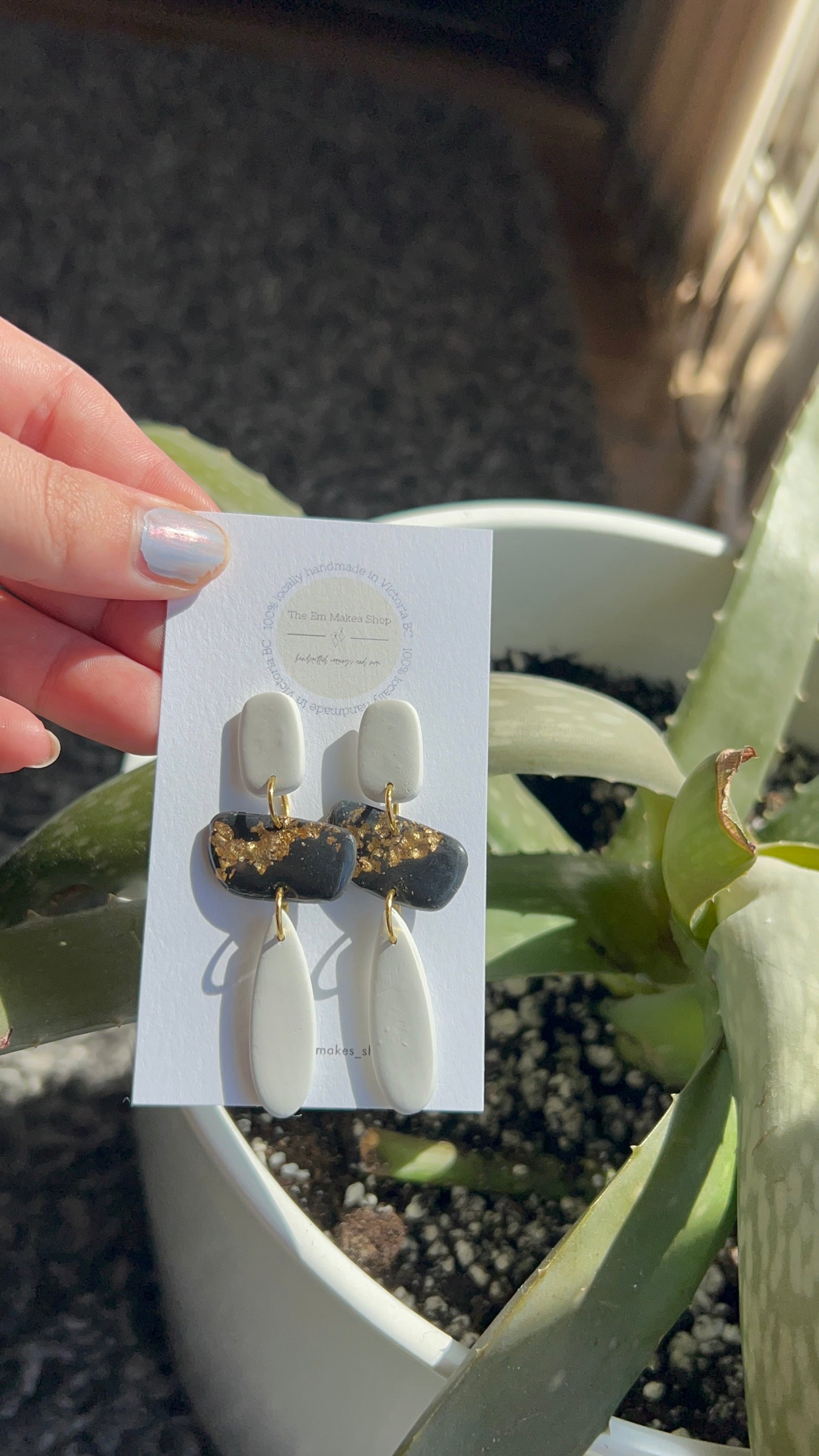 Black white and gold dangles