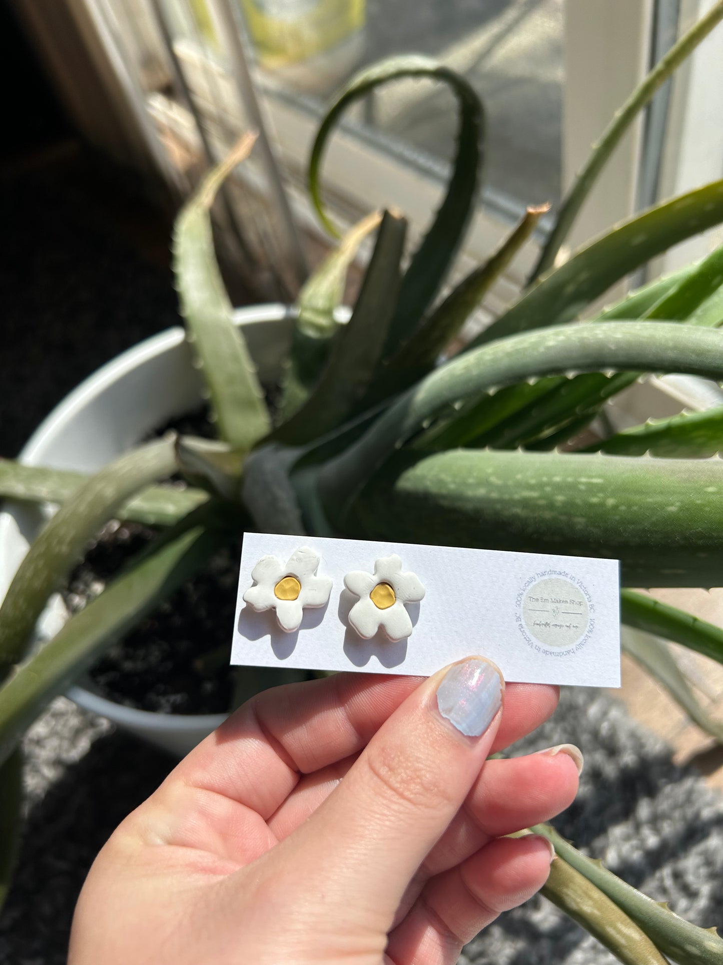 Asymmetrical flower studs