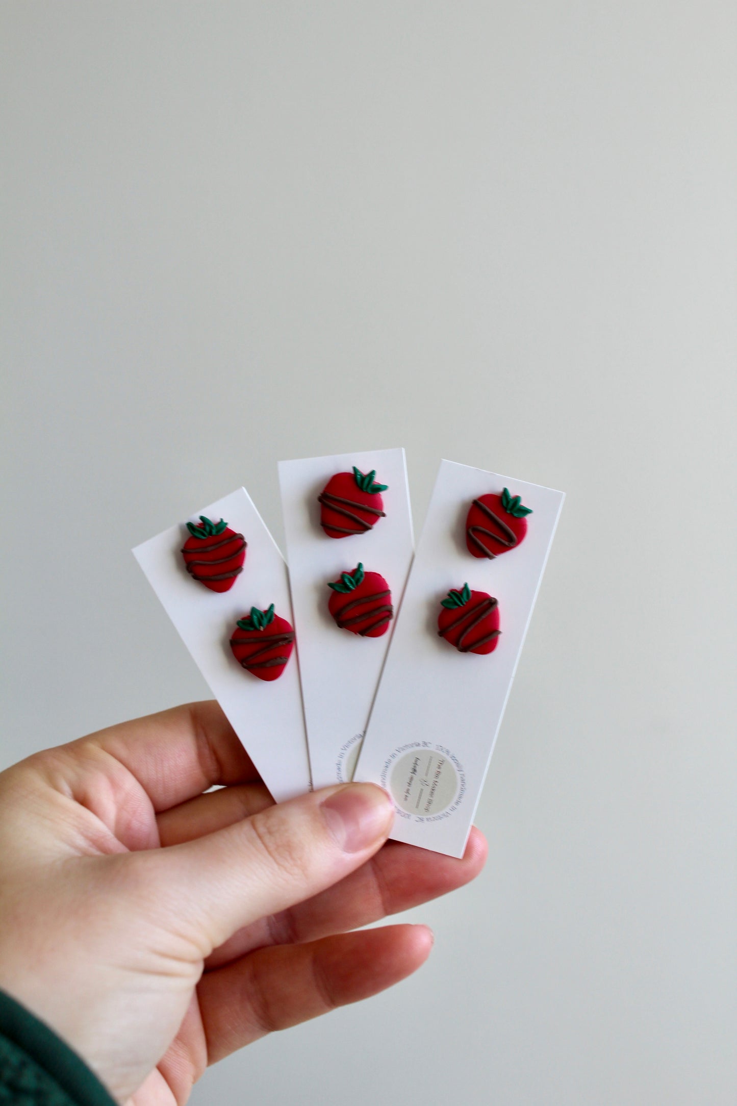 Chocolate drizzled strawberry studs